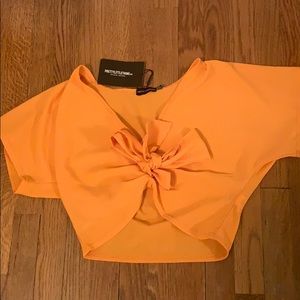 front tie orange top